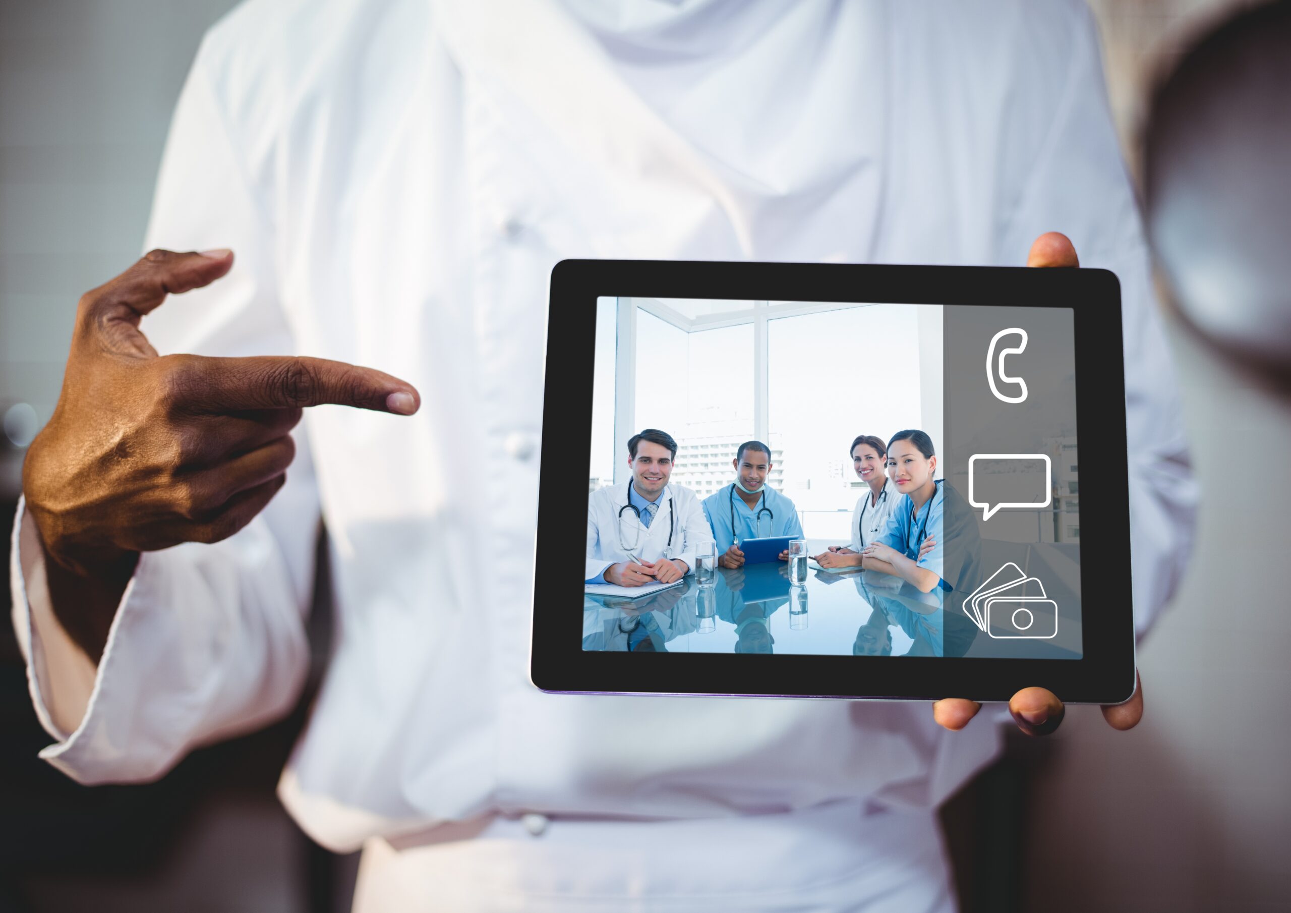 Doctor showing video chat on digital tablet